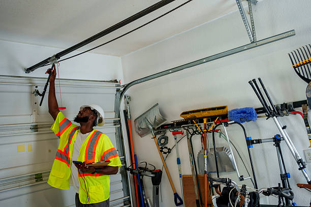 Professional Garage Door Spring Repair technician working in Muhlenberg Park, PA